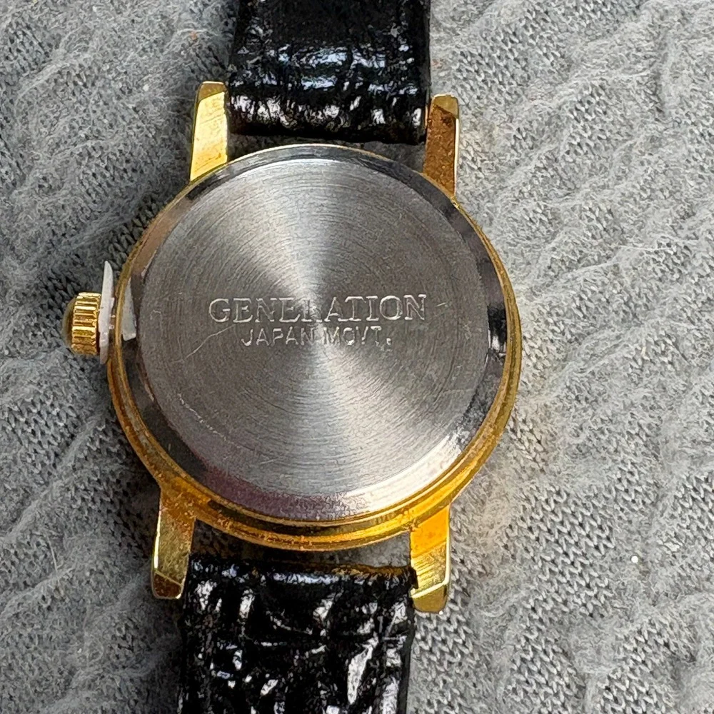 Generation Diamond Quartz Watch Gold Tone Black Dial Genuine Diamond Japan Movt